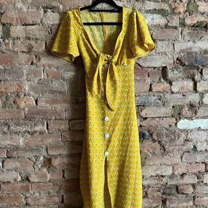 Women's yellow dress with short flowy sleeves, tie front and tie back